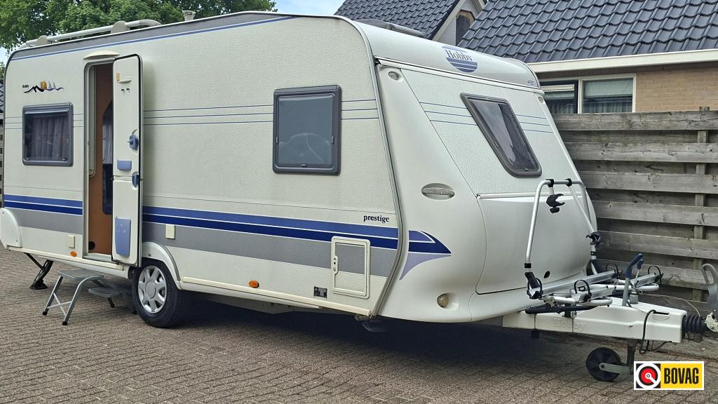 Hobby Prestige 495 UFE Inclusief voortent., Caravans en Kamperen, Caravans, Rondzit, Bedrijf, 4 tot 5 meter, Schokbreker