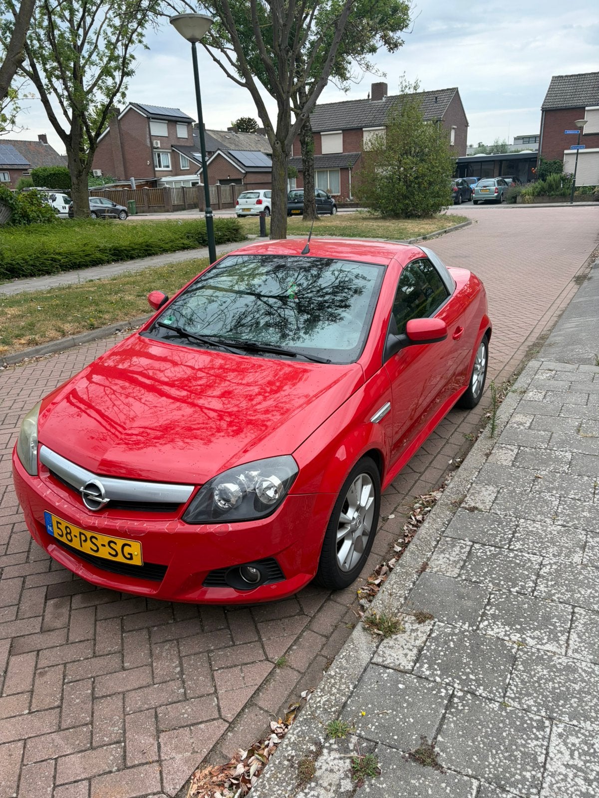 Opel Tigra 1.4 16V Twintop 2004 Rood, Voorwielaandrijving, Stof, 4 cilinders, Cabriolet