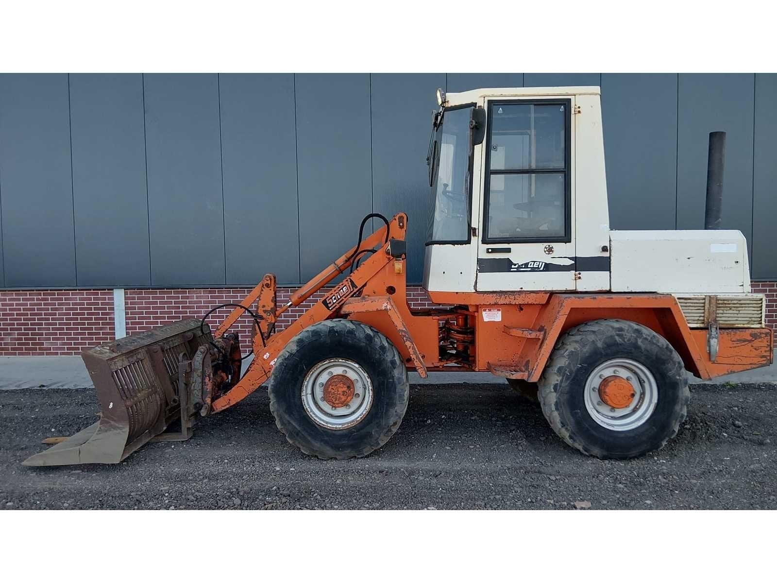 1990 schaeff - Knikwiellader met roosterbak, Zakelijke goederen, Wiellader of Shovel