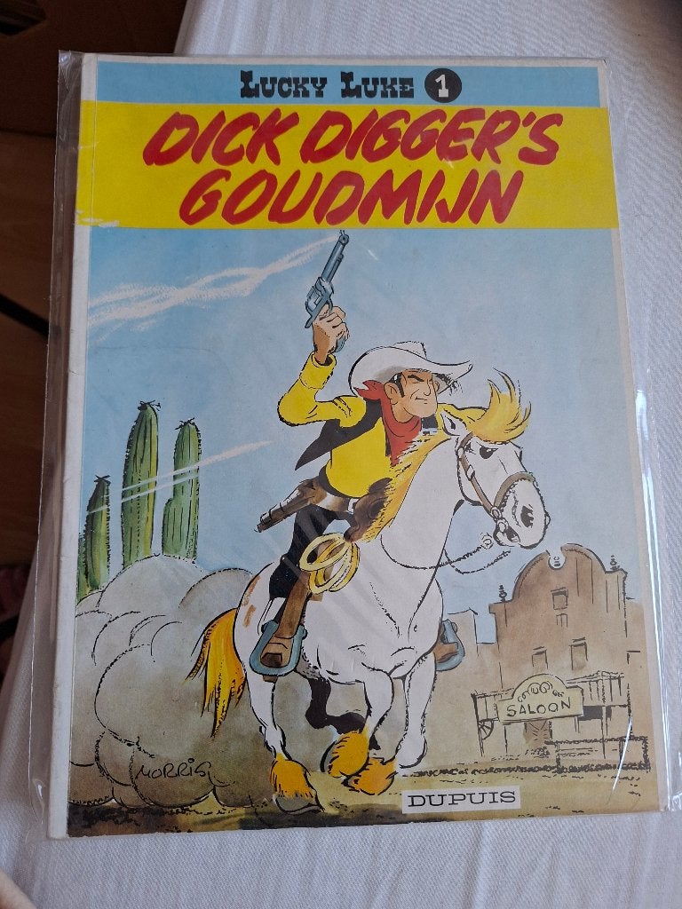 Lucky Luke 1, Dick Digger's goudmijn, Eén stripboek, Ophalen of Verzenden, Gelezen