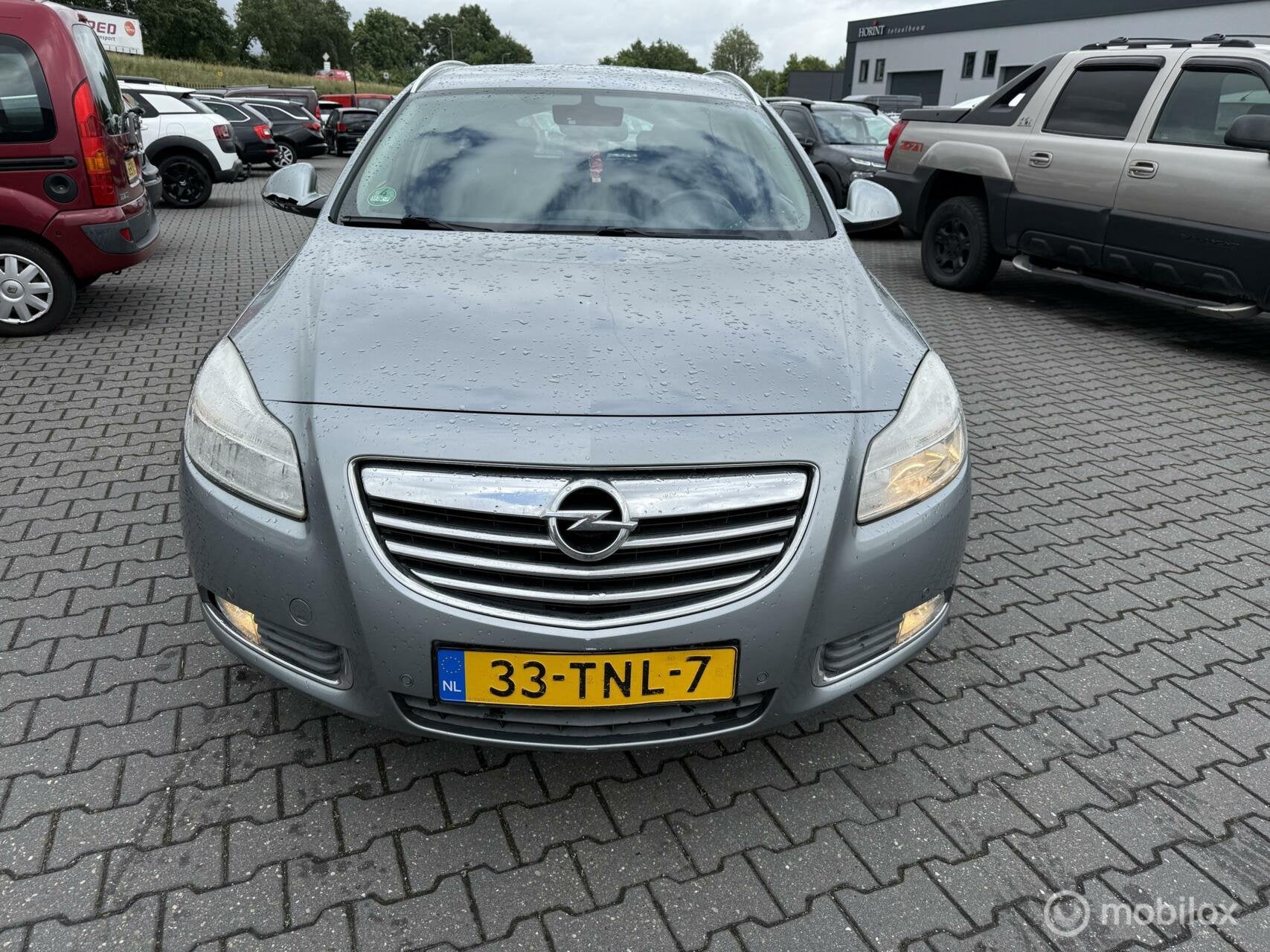 Opel Insignia Sports Tourer 1.4 Turbo EcoFLEX Business Editi, Auto's, Opel, Euro 5, Stof, Gebruikt, Zwart