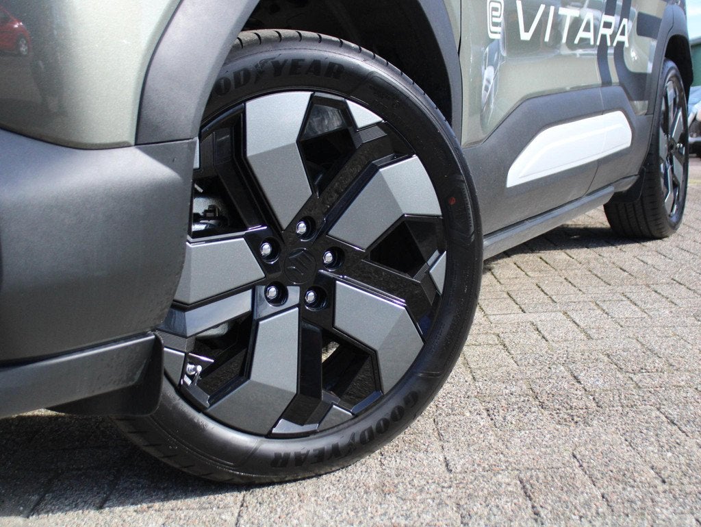 Suzuki e VITARA Style 61 kWh Elektrische Bestuurdersstoel, S, Auto's, Suzuki, 12 maanden, Gebruikt, 750 kg, 61 kWh