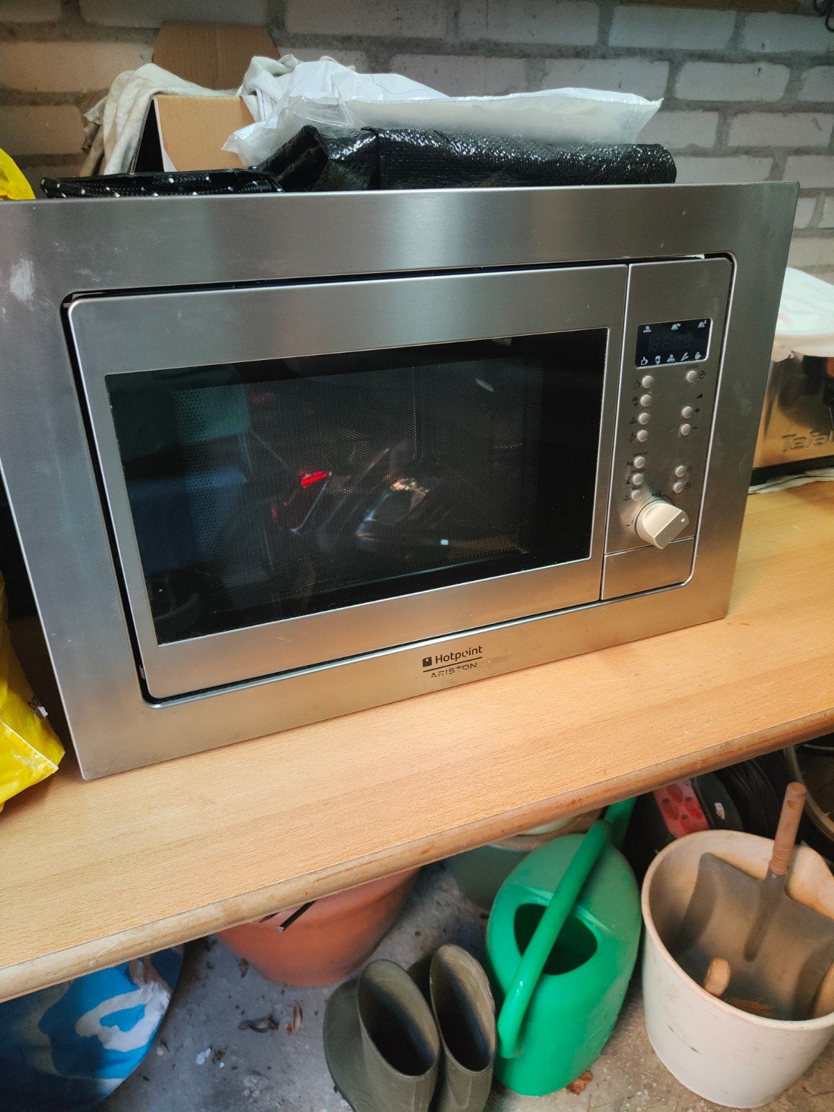 inbouw magnetron, Ophalen, Inbouw