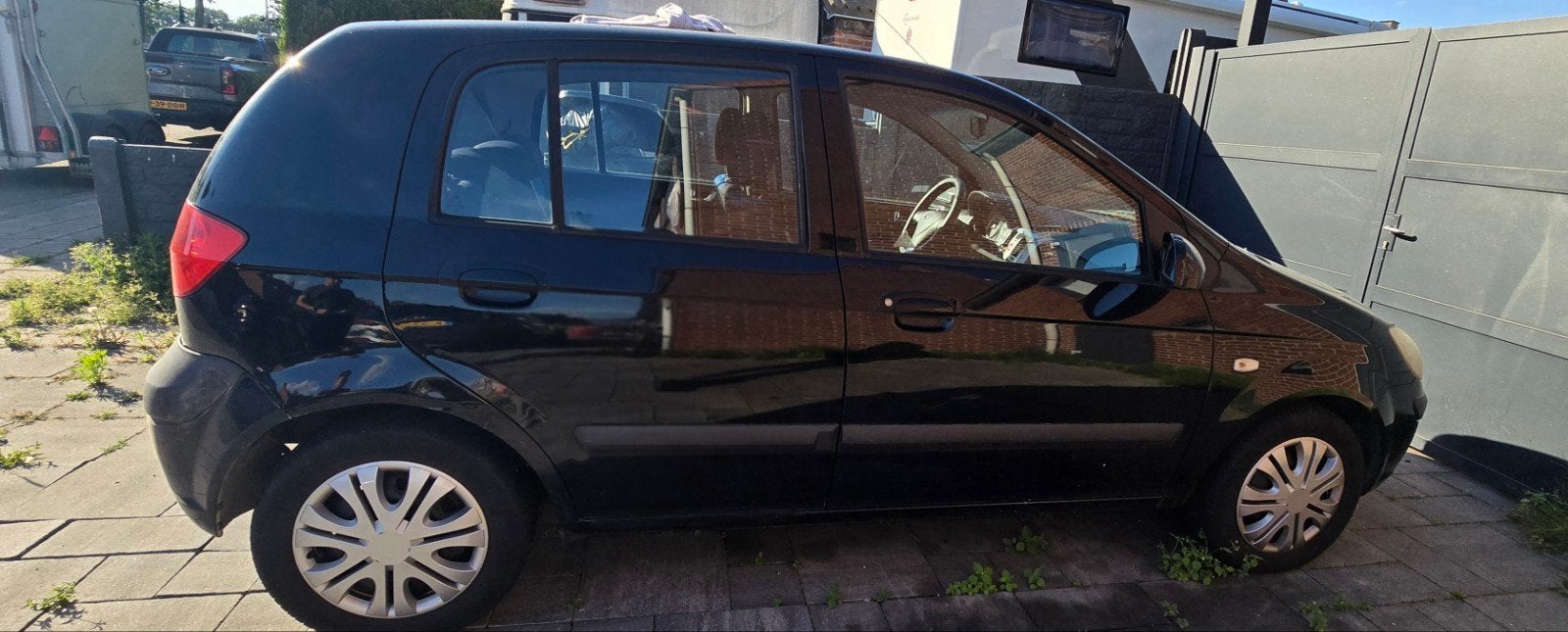 Hyundai Getz 1.4 5DRS 2006 Zwart, Auto's, Hyundai, Voorwielaandrijving, 40 €/maand, 4 cilinders, Zwart