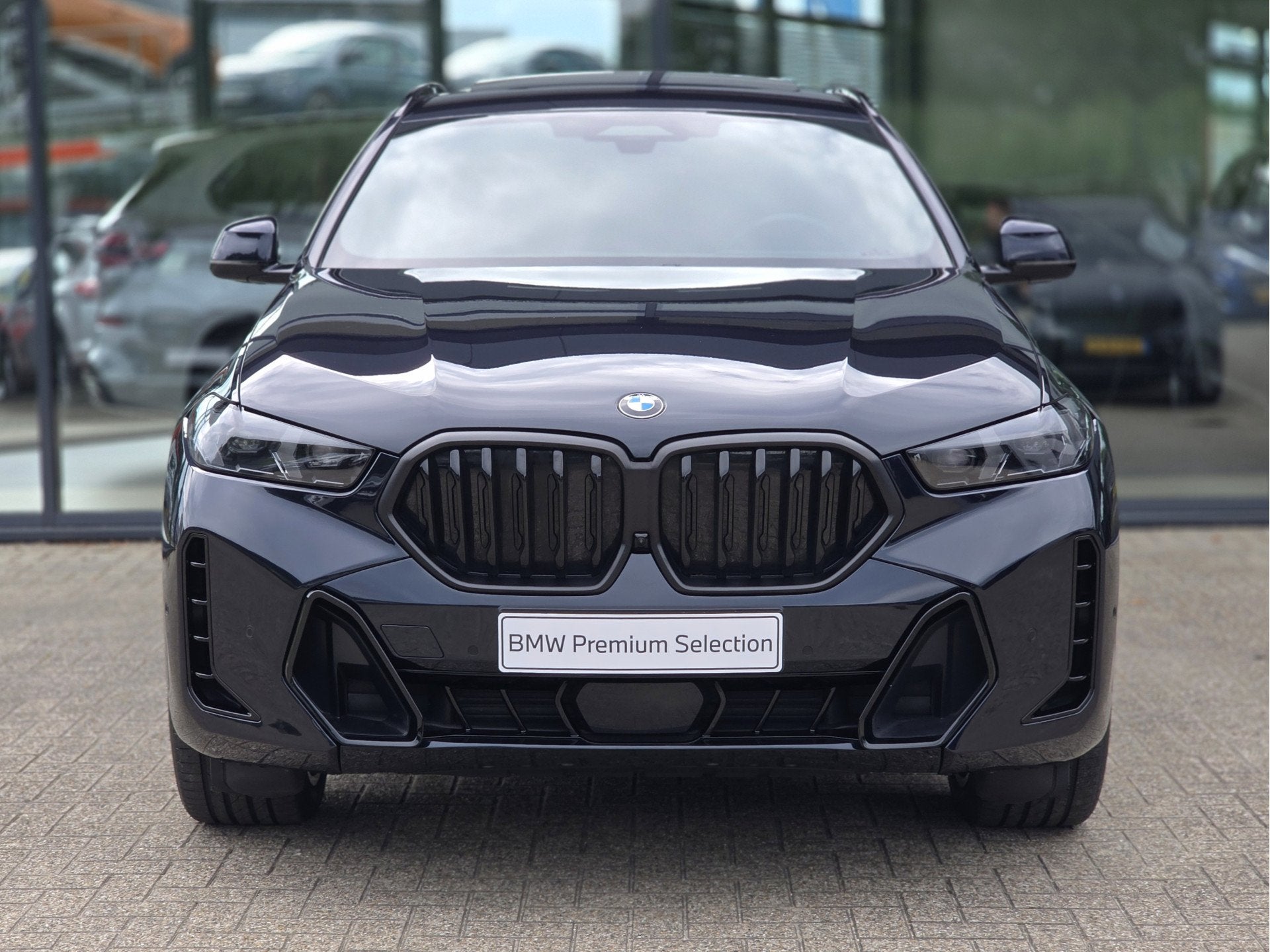 BMW X6 xDrive40i M Sport Automaat / Trekhaak / Panoramadak /, Auto's, Gebruikt, Met garantie (alle), 138 €/maand, Zwart