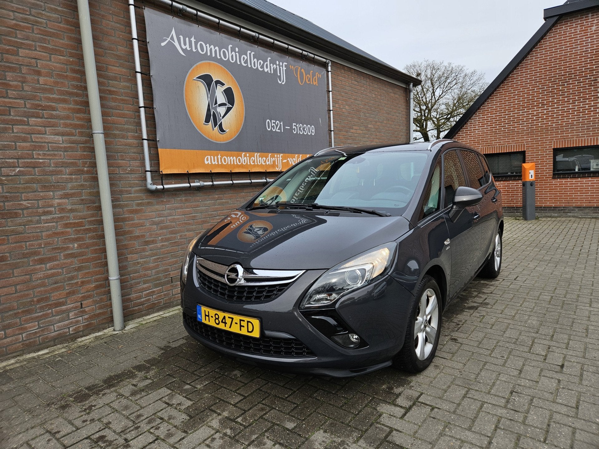 Opel Zafira Tourer 1.6 Design Edition (bj 2014, automaat), Auto's, Euro 5, Stof, Gebruikt, Zwart