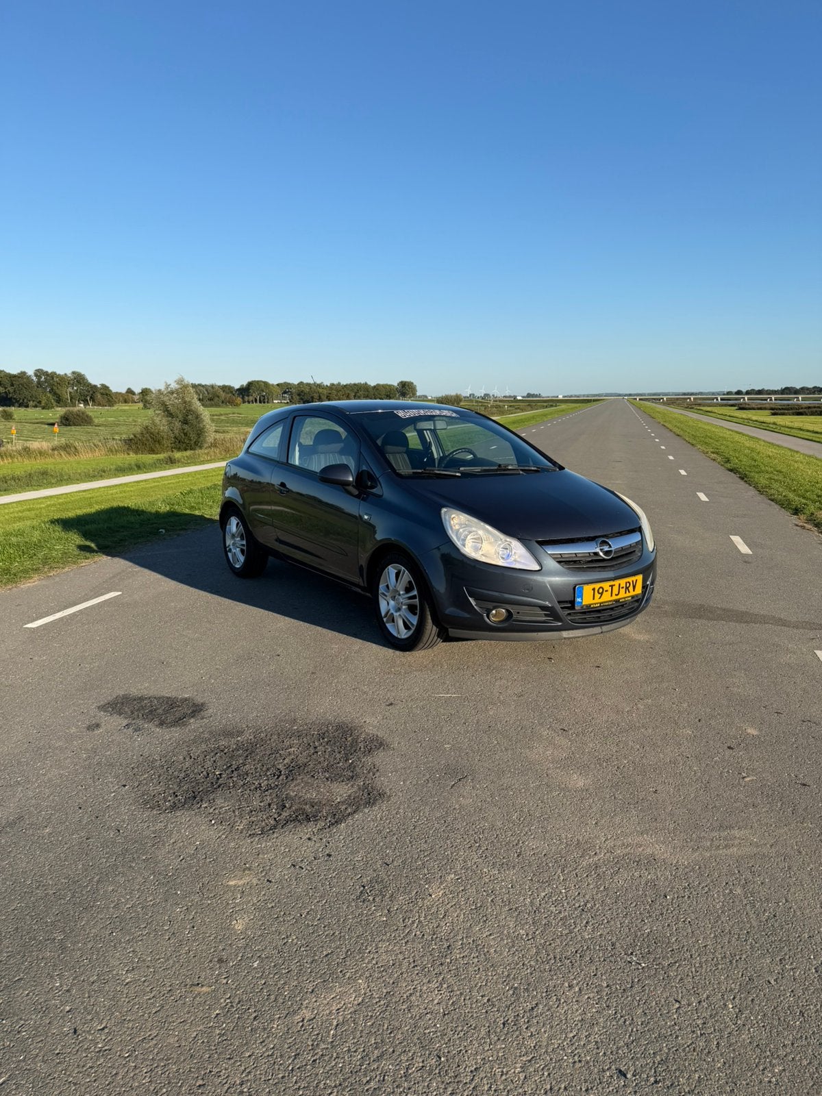 Opel Corsa D 1.2 Benzine – 2006 – 299.960 km, Voorwielaandrijving, 40 €/maand, Zwart, 4 cilinders