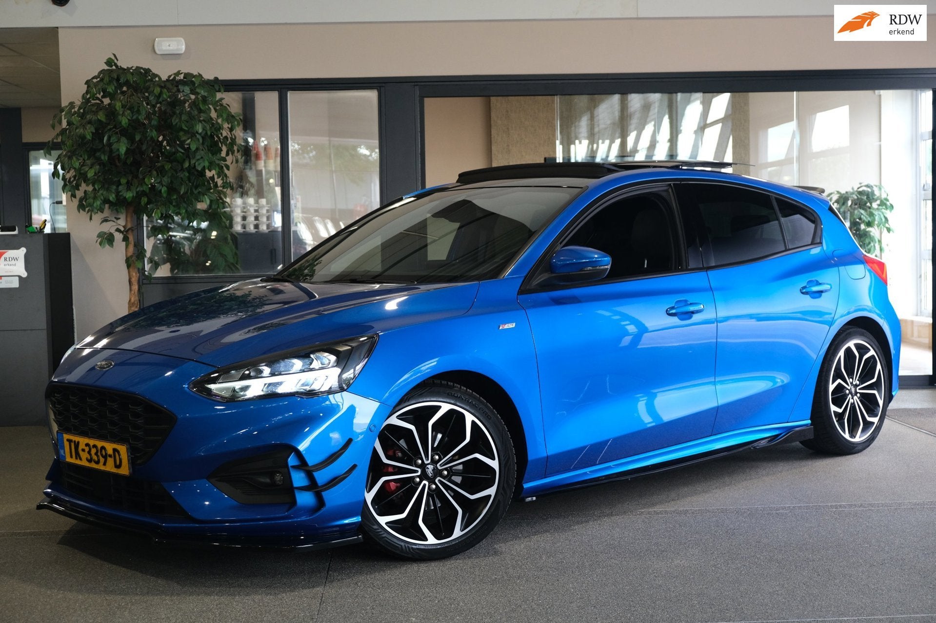 Ford Focus 1.0 EcoBoost ST Line 125 PK Pano Navi Led B&O Cru, Auto's, Gebruikt, Blauw, Origineel Nederlands, Bedrijf