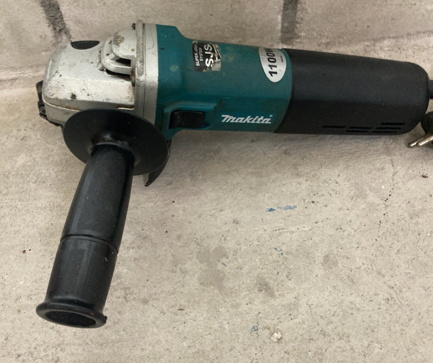 Makita Haakse Slijper 1100W - Model 9565H, Ophalen of Verzenden, Gebruikt, 1000 watt of meer, Haakse handslijpmachine