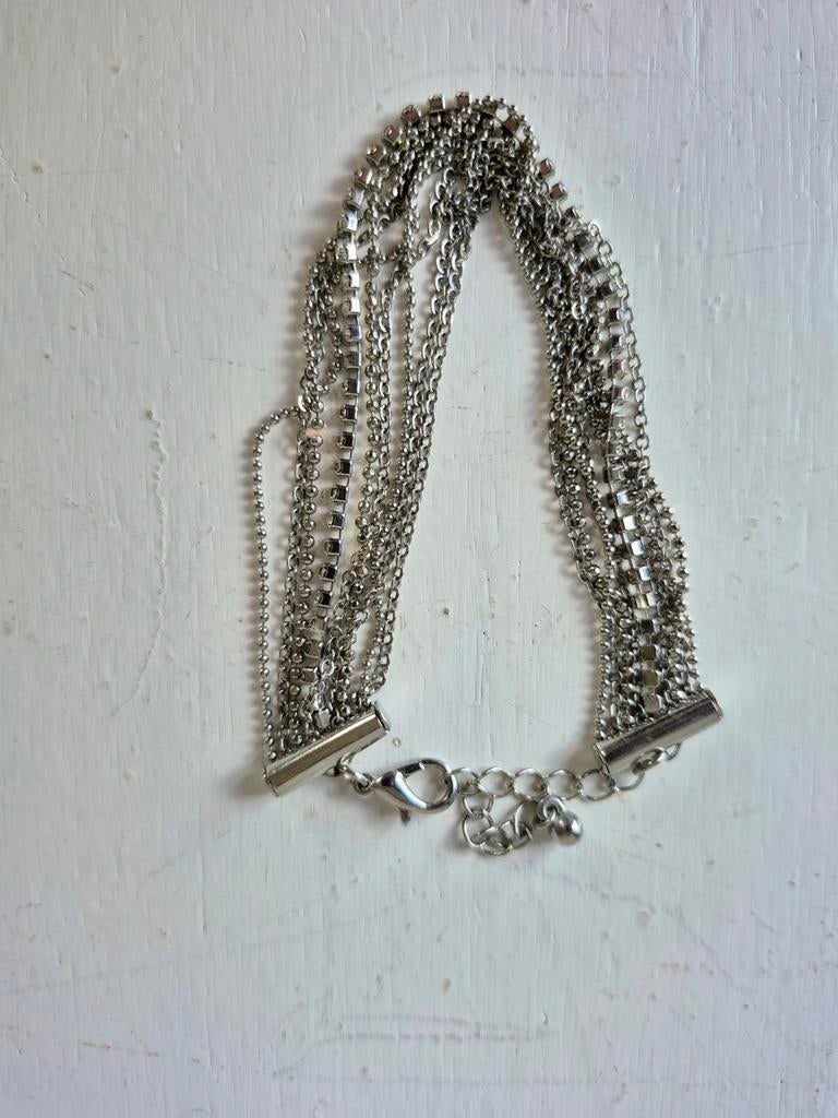 Stijlvolle zilverkleurige armband, 22cm lengte, Ophalen of Verzenden, Gebruikt, Zilver, Overige materialen