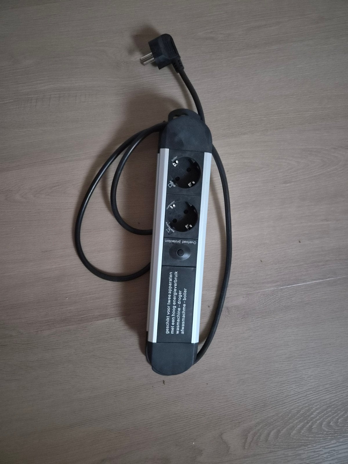 Stekkerdoos voor wasmachine en droger, Ophalen