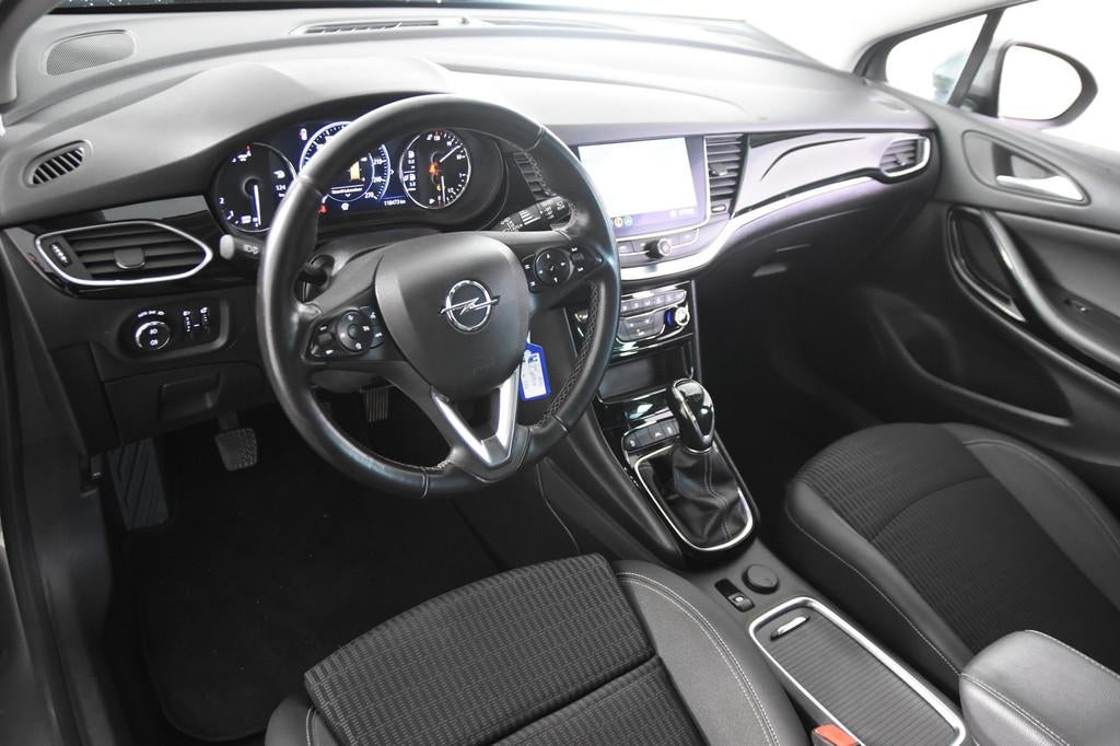 Opel Astra Sports Tourer 1.5 CDTI Elegance (bj 2020), Auto's, Opel, Voorwielaandrijving, Gebruikt, Leder en Stof, 3 cilinders