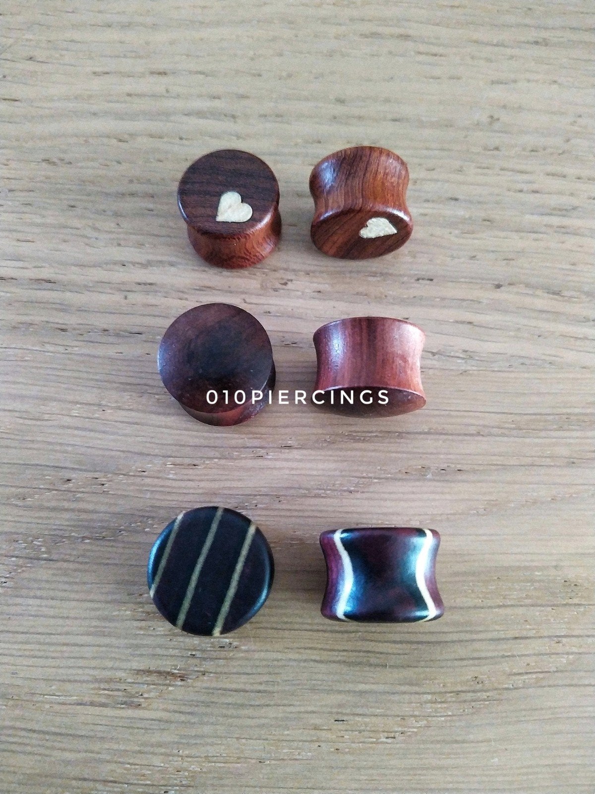 Nieuwe tunnels, pluggen. Hout. Double flared. 16 Mm., Ophalen of Verzenden, Zo goed als nieuw, Overige materialen, Oor- of Traguspiercing