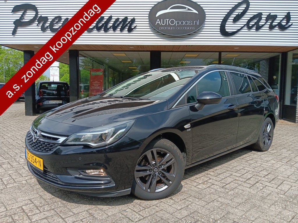 Opel Astra Sports Tourer 1.4 Turbo 120 Jaar Edition|AUTOMAAT, Auto's, Opel, Stof, Gebruikt, 150 pk, Zwart