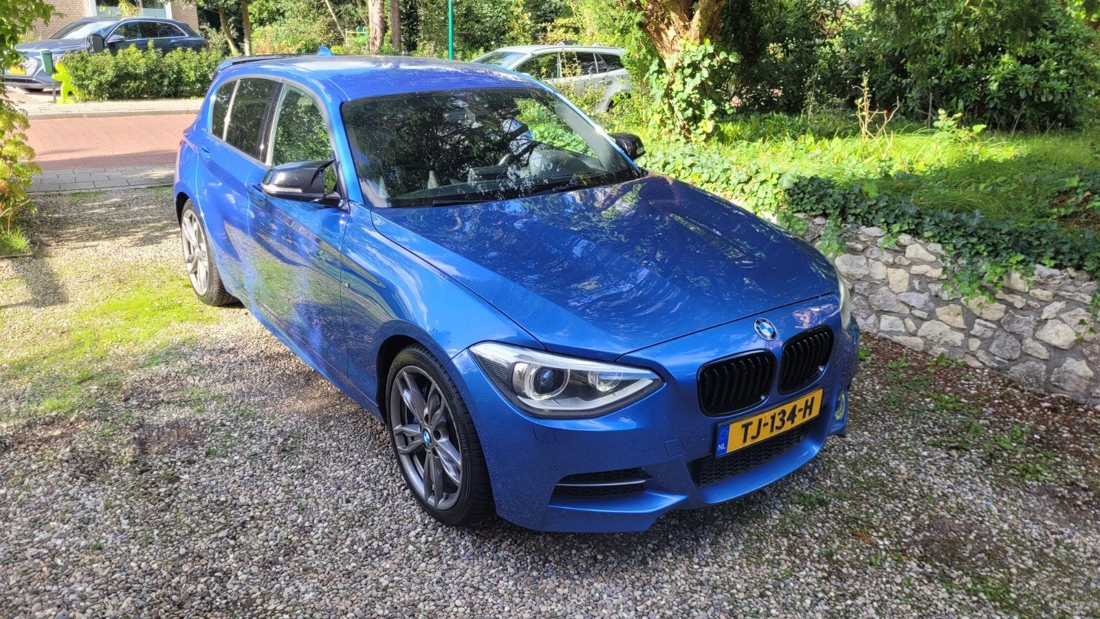 BMW M135i 5DR Xdrive AUT 2013 Estoril Blauw, Bluetooth, Zwart, Alcantara, Vierwielaandrijving
