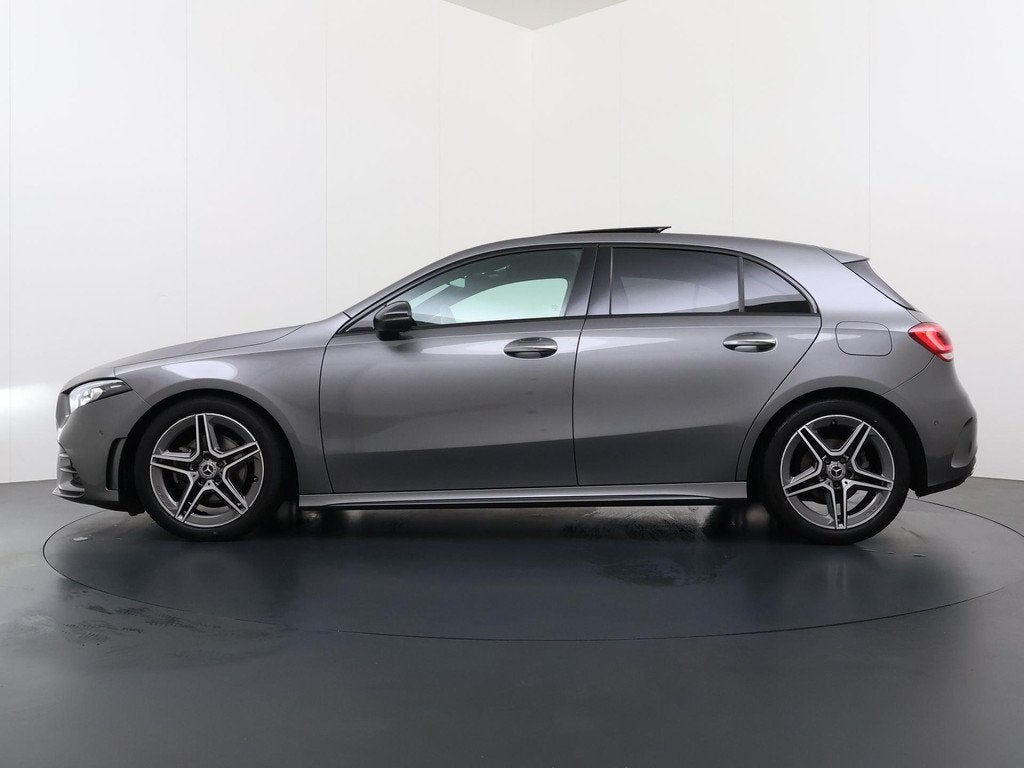 Mercedes-Benz A-klasse 180 AMG Business Solution | Panorama, Auto's, Mercedes-Benz, 136 pk, Gebruikt, 4 cilinders, Leder en Stof