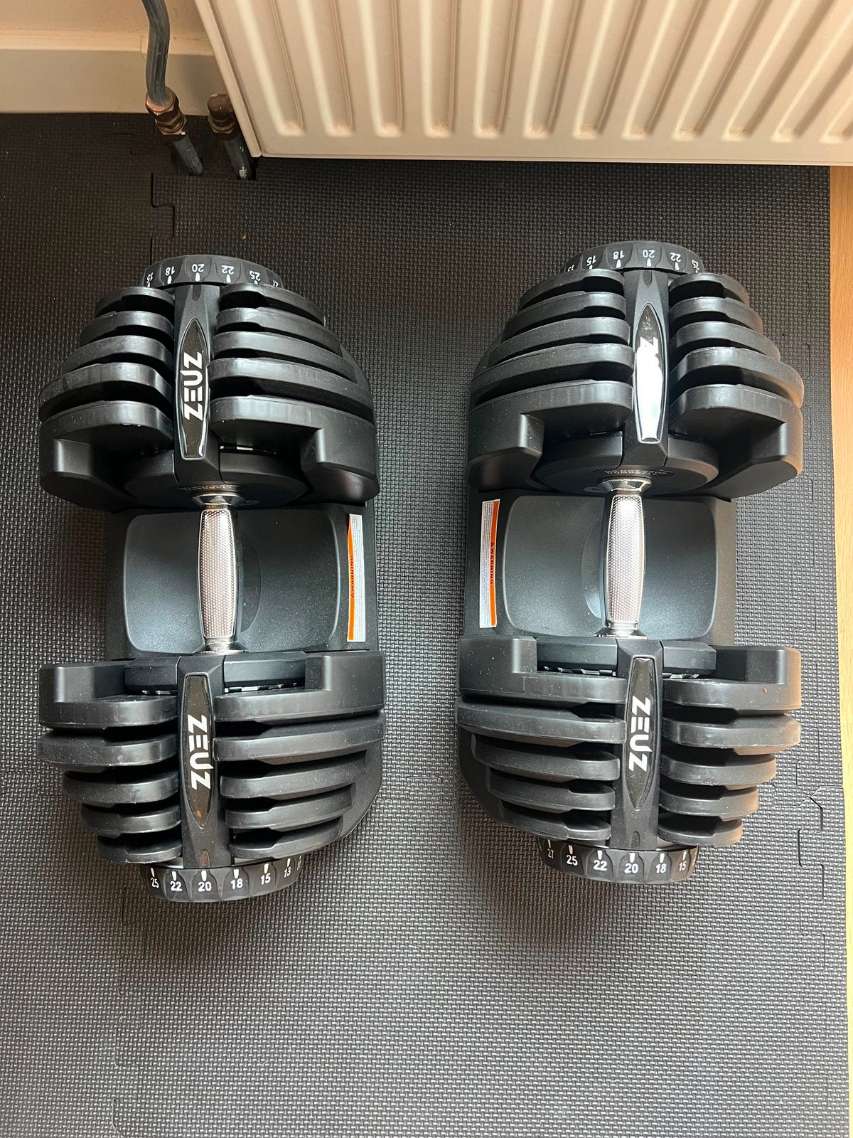 Verstelbare dumbbells Zeuz (2 tot 30 kg), Ophalen