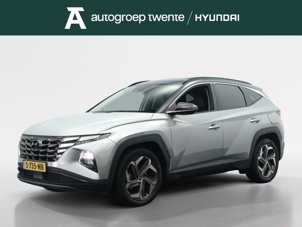 Hyundai Tucson 1.6 T-GDI HEV Premium | Leder | Navigatie | S, Auto's, Hyundai, 12 maanden, Gebruikt, 4 cilinders, 1650 kg
