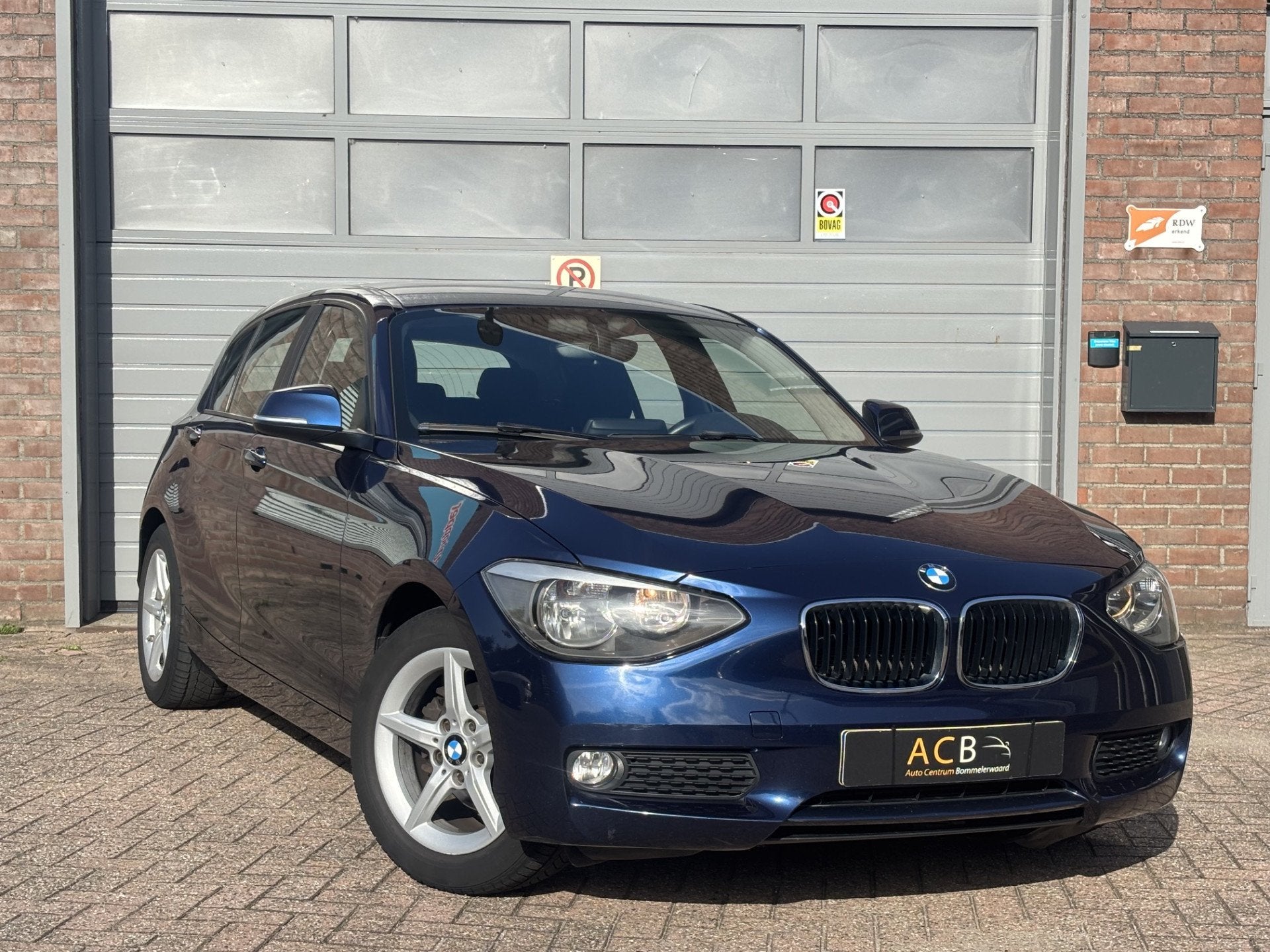BMW 1-serie 114i EDE Navigatie/ LM velgen (bj 2013), Auto's, 1-Serie, Gebruikt, Euro 6, 4 cilinders