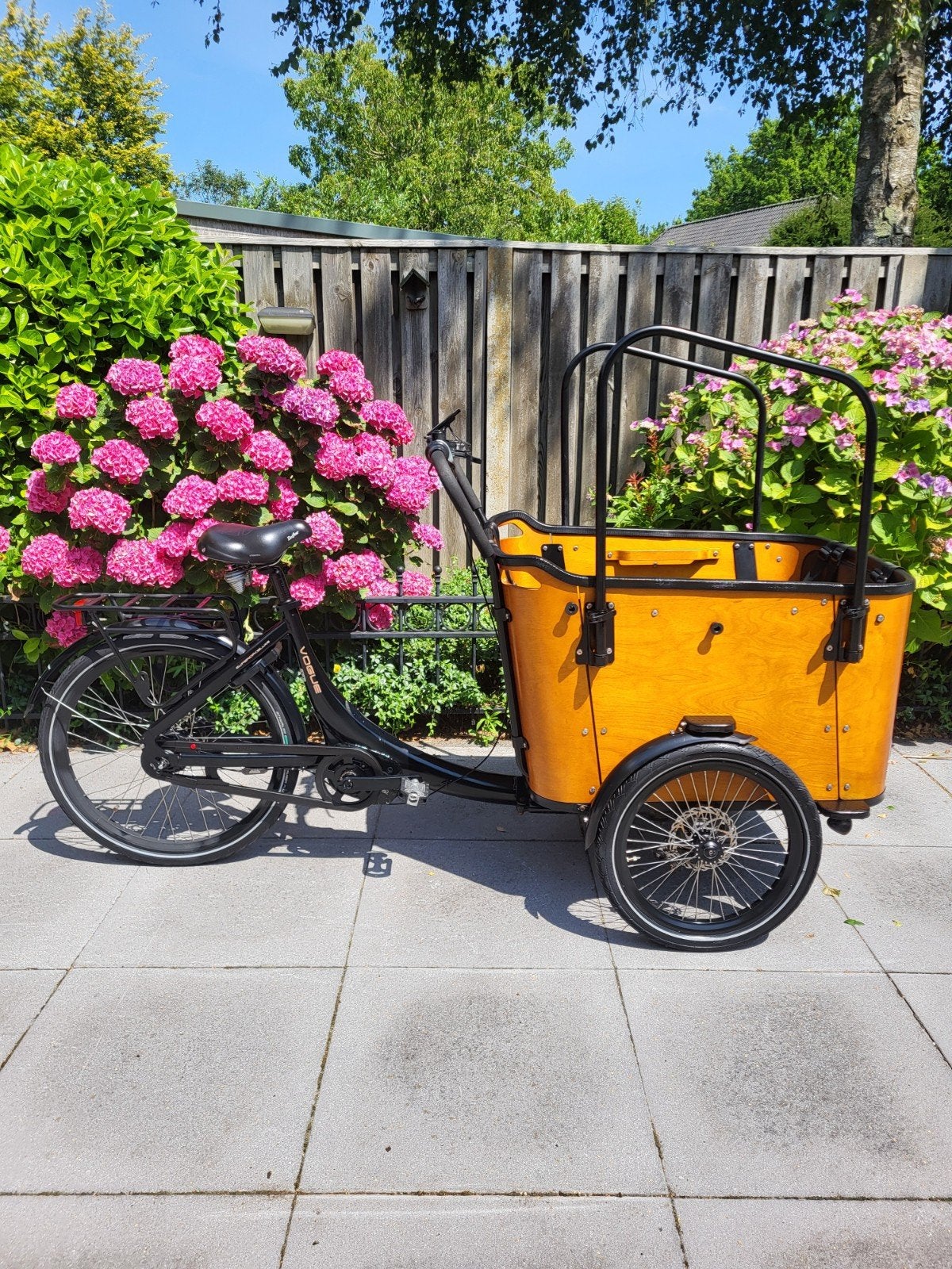 Vogue Bakfiets met Bafang Middenmotor en regenhuif nieuw, Ophalen, Zo goed als nieuw, 4 kinderen of meer