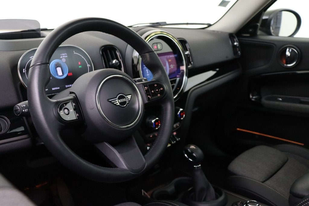 MINI Countryman Cooper S E ALL4 Essence / Panoramadak / Comf, Auto's, Mini, Gebruikt, Zwart, Met garantie (alle), Leder en Stof