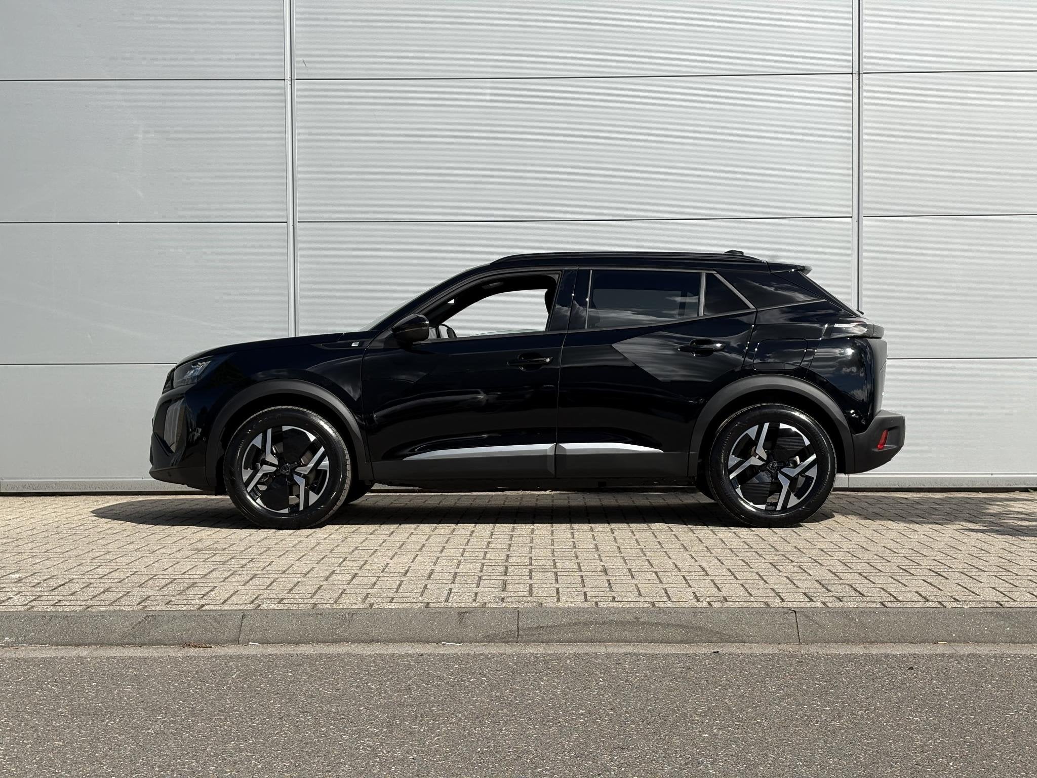 Peugeot e-2008 EV Allure 54 kWh | Adaptieve Cruise Control |, Auto's, 156 pk, Leder en Stof, Zwart, SUV of Terreinwagen