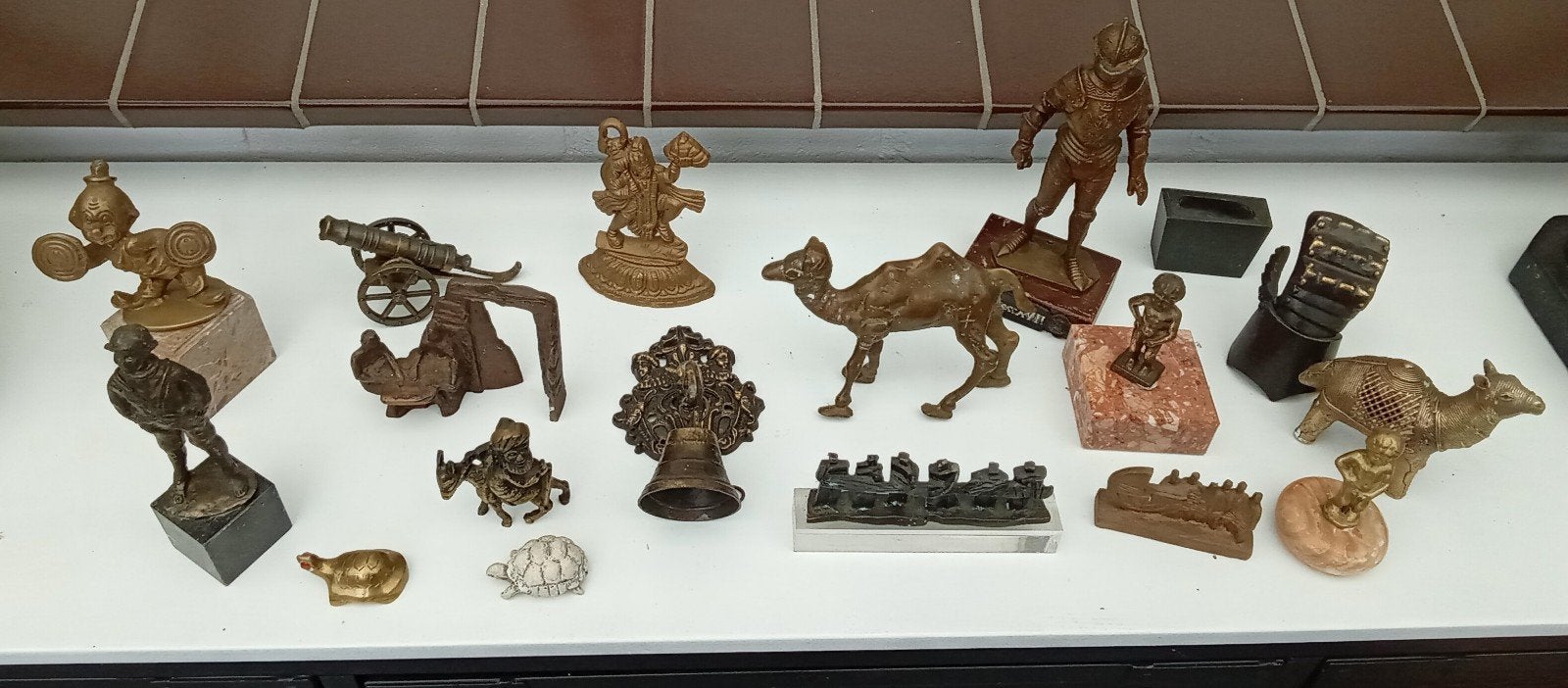 Diverse bronzen en koperen beeldjes collectie, Ophalen