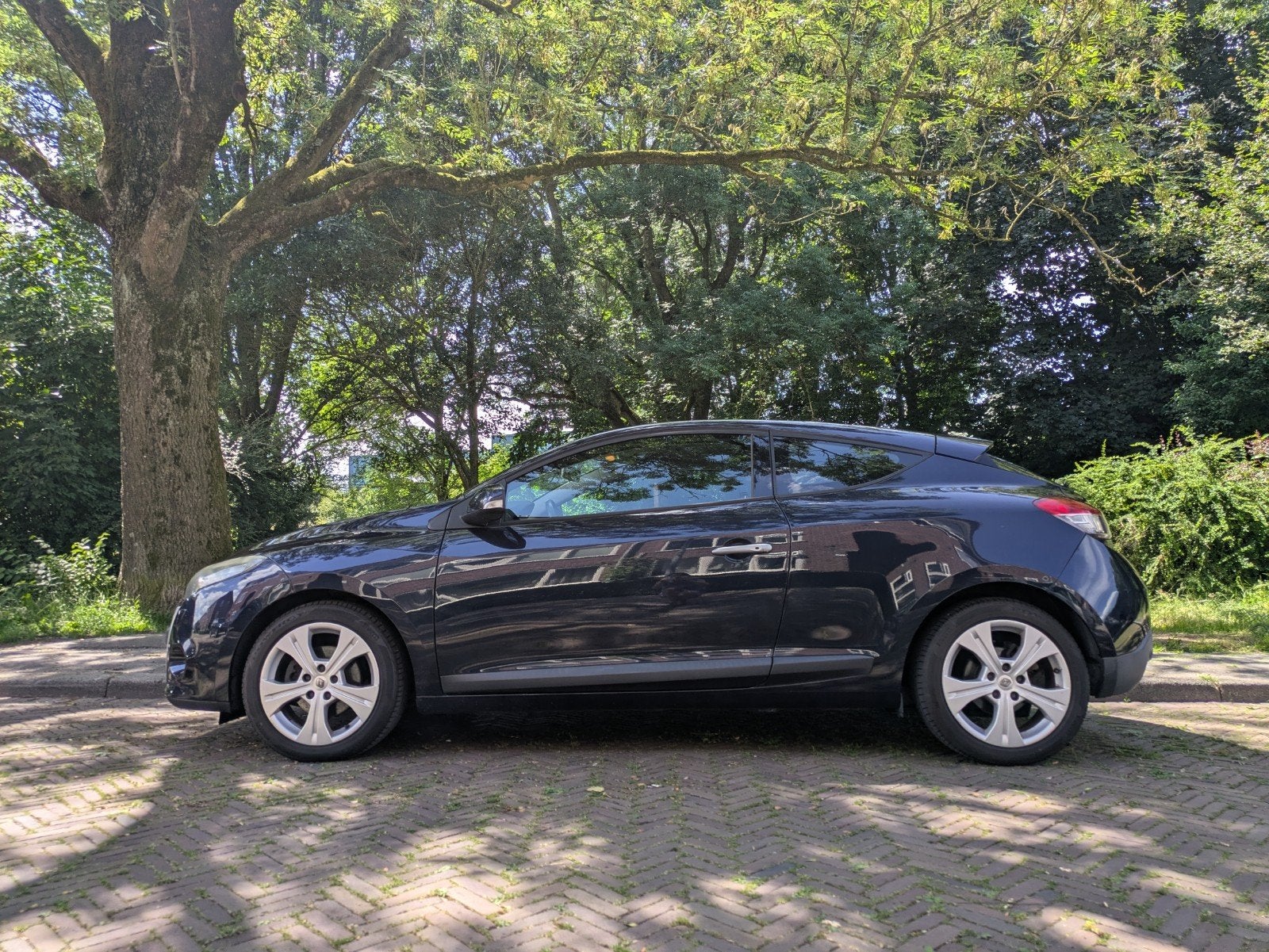 Renault Mégane Coupé 1.6 Dynamique 110 pk 2009 Blauw, Auto's, Renault, Voorwielaandrijving, Stof, 4 cilinders, Blauw
