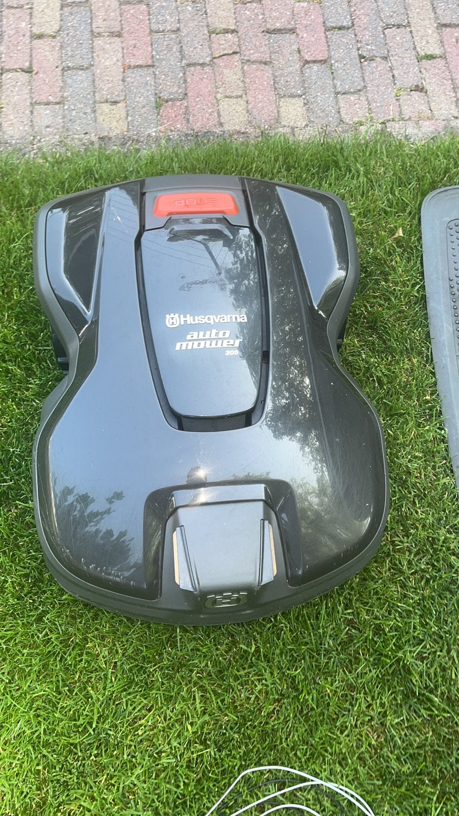 Robotmaaier Husqvarna 305 excl. grensdraad., Tuin en Terras, Ophalen, Zo goed als nieuw, 20 tot 25 cm