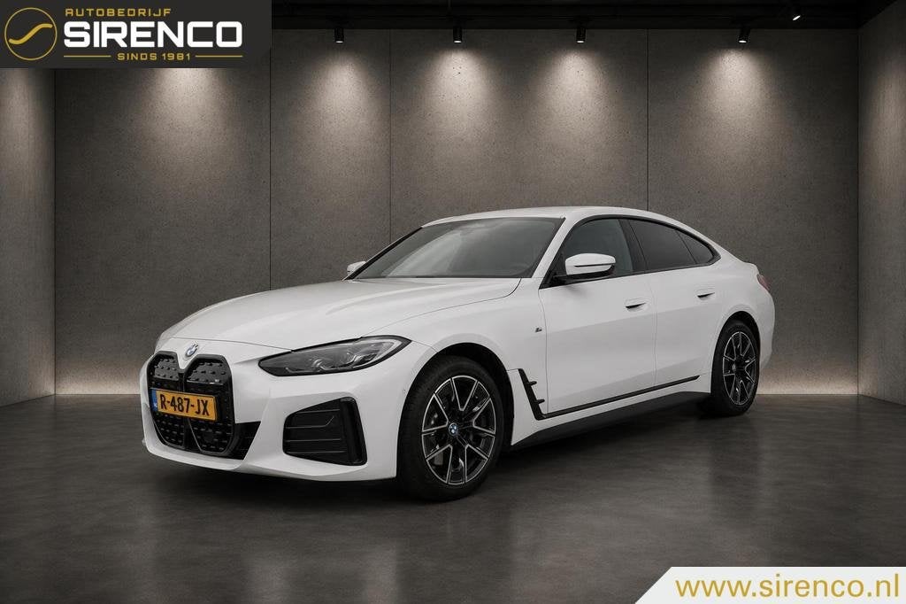 BMW i4 eDrive40 High Executive 84 kWh | M pakket | virtual w, Auto's, Achterwielaandrijving, Zwart, Met garantie (alle), Autotrust