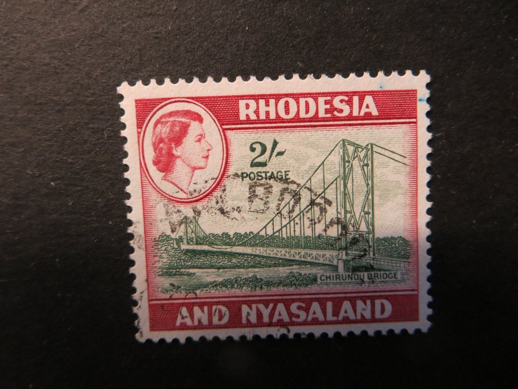 A00331: Rhodesia & Nyasaland QEII 2/-, Postzegels en Munten, Postzegels | Afrika, Ophalen of Verzenden, Tanzania