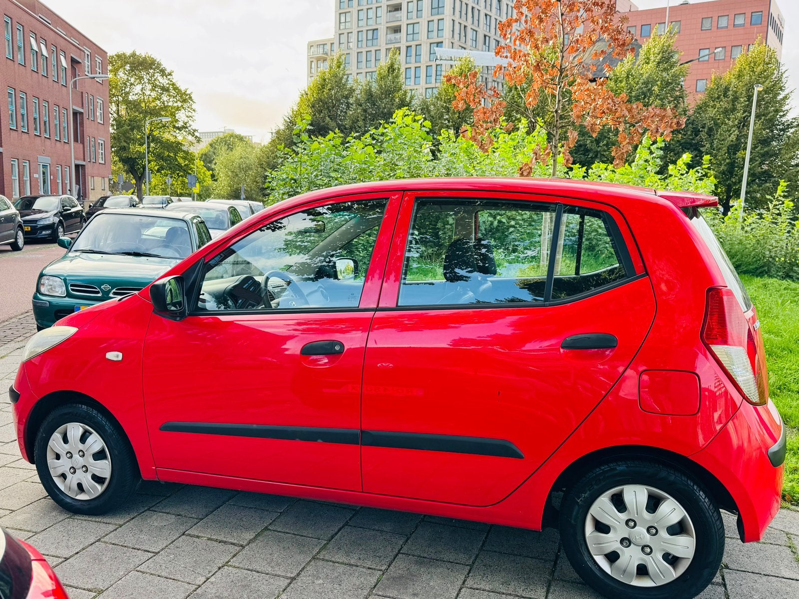 Foto 6 van Hyundai i10 1.1 I 5DR 2008 Rood