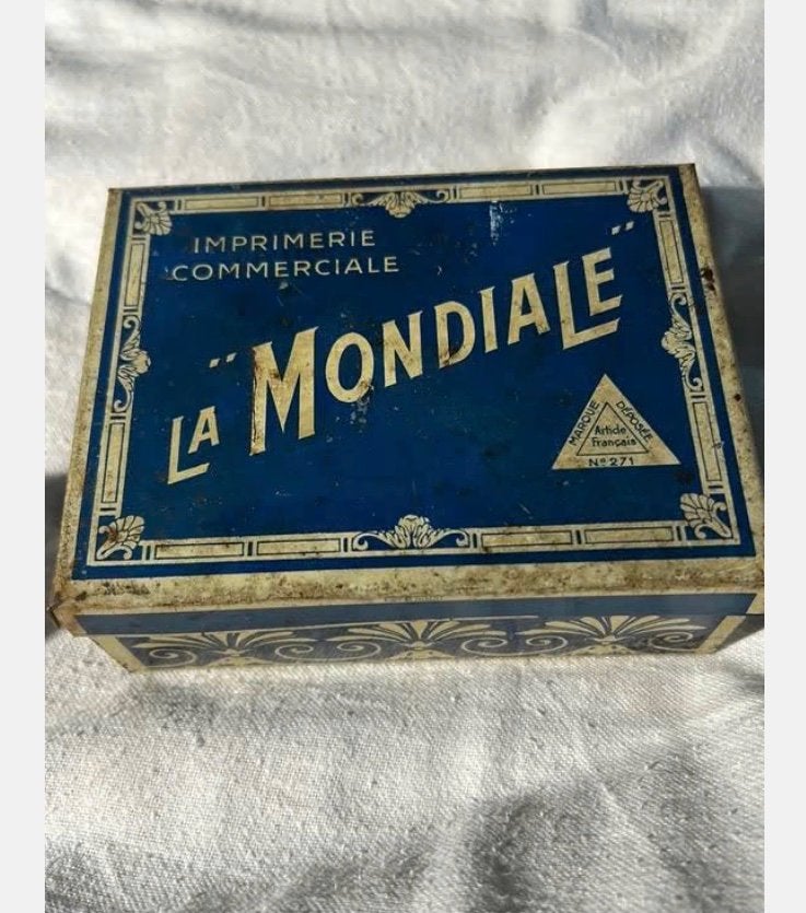 1920-1930 Vintage blik Frans, La mondiale, drukkerij letters, Ophalen of Verzenden, Gebruikt, Overige