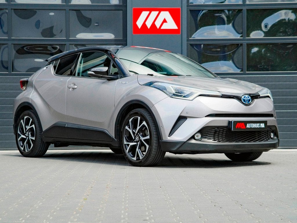 Toyota C-HR 1.8 Hybrid Bi-Tone | TREKHAAK | CAMERA |, Auto's, Toyota, 135 pk, Euro 6, 4 cilinders, Leder en Stof