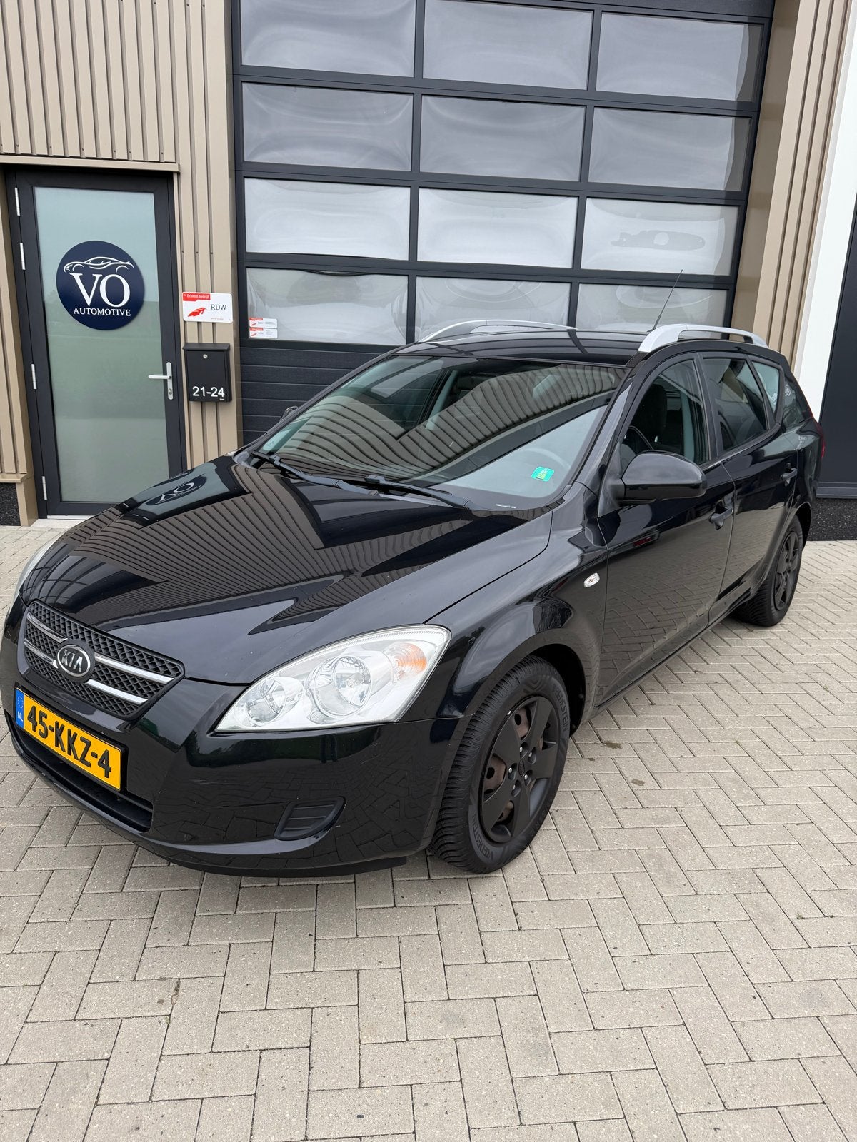Kia (Pro) Ceed 1.4 16v Sporty Wagon 2010 Zwart, Auto's, Voorwielaandrijving, Stof, 4 cilinders, 1396 cc