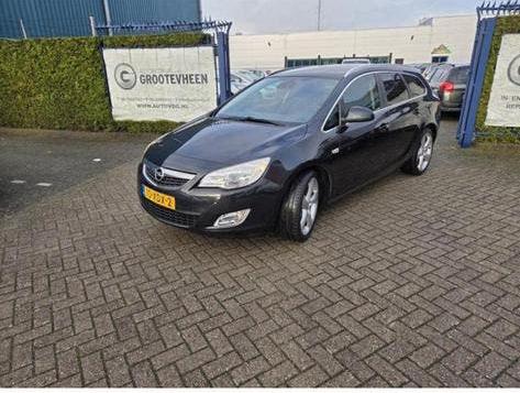 Opel Astra Sports Tourer 1.4 Turbo Cosmo, Auto's, Voorwielaandrijving, Zwart, 4 cilinders, Leder en Stof