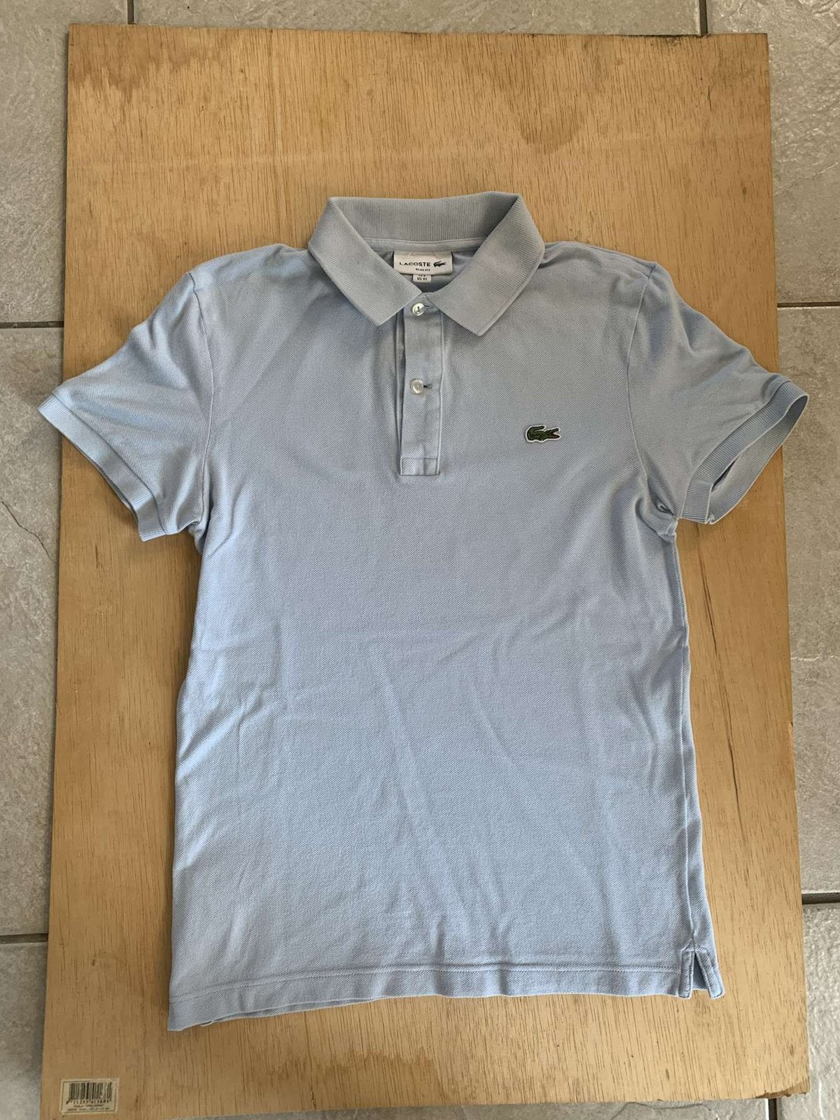 Lacoste Polo - Maat: XS - Zo goed als nieuw, Ophalen of Verzenden, Zo goed als nieuw, Maat 46 (S) of kleiner, Blauw