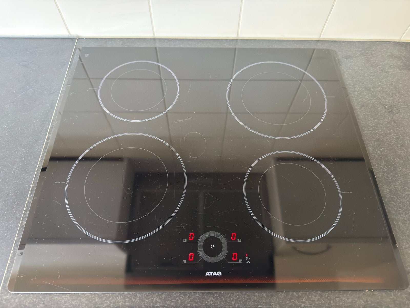 ATAG HI6271E Inductiekookplaat - 4 zones, Witgoed en Apparatuur, Gebruikt, Inbouw, Inductie, 4 kookzones