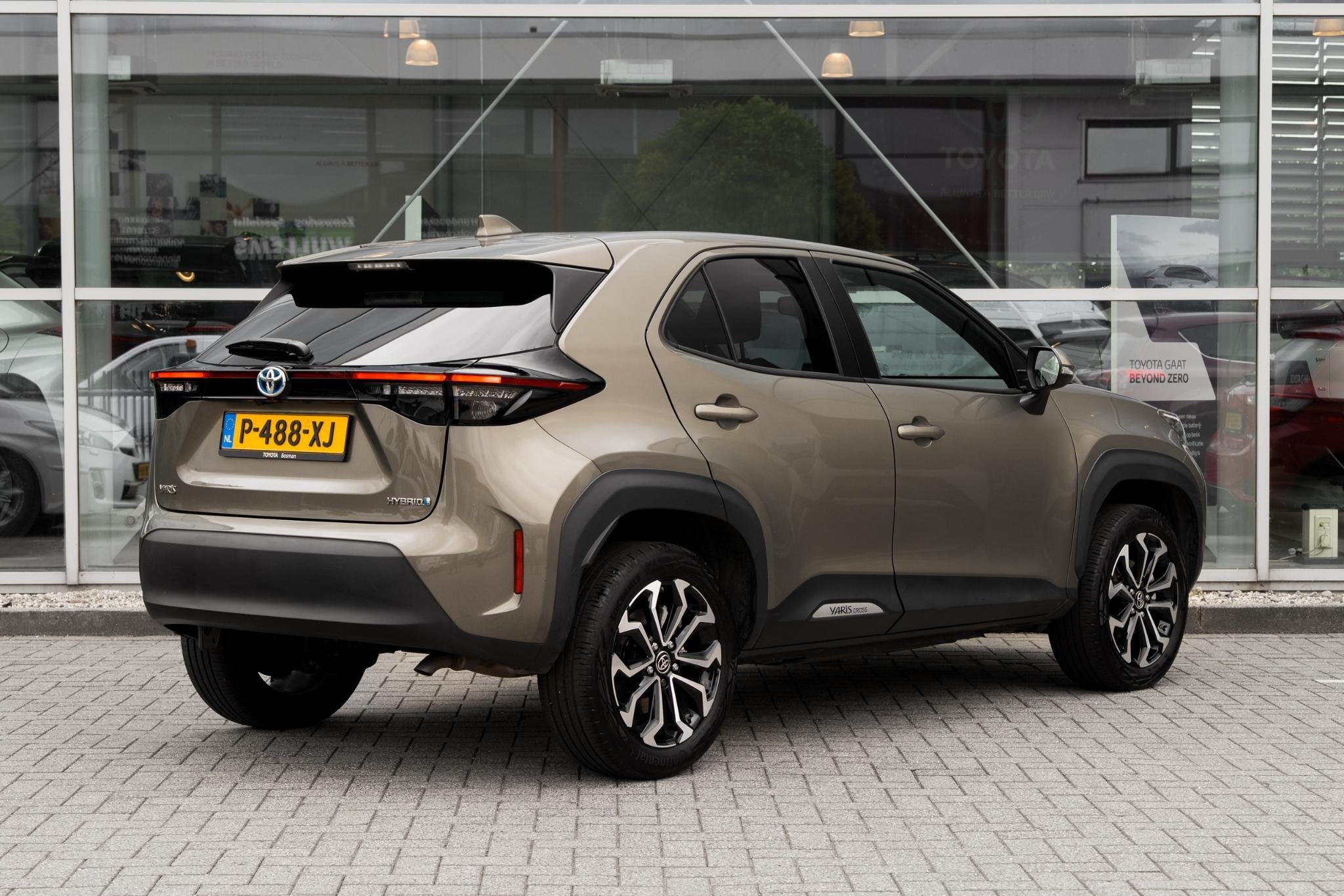 Toyota Yaris Cross 1.5 Hybrid First Edition, Auto's, Stof, Gebruikt, Automatische klimaatregeling, 116 pk