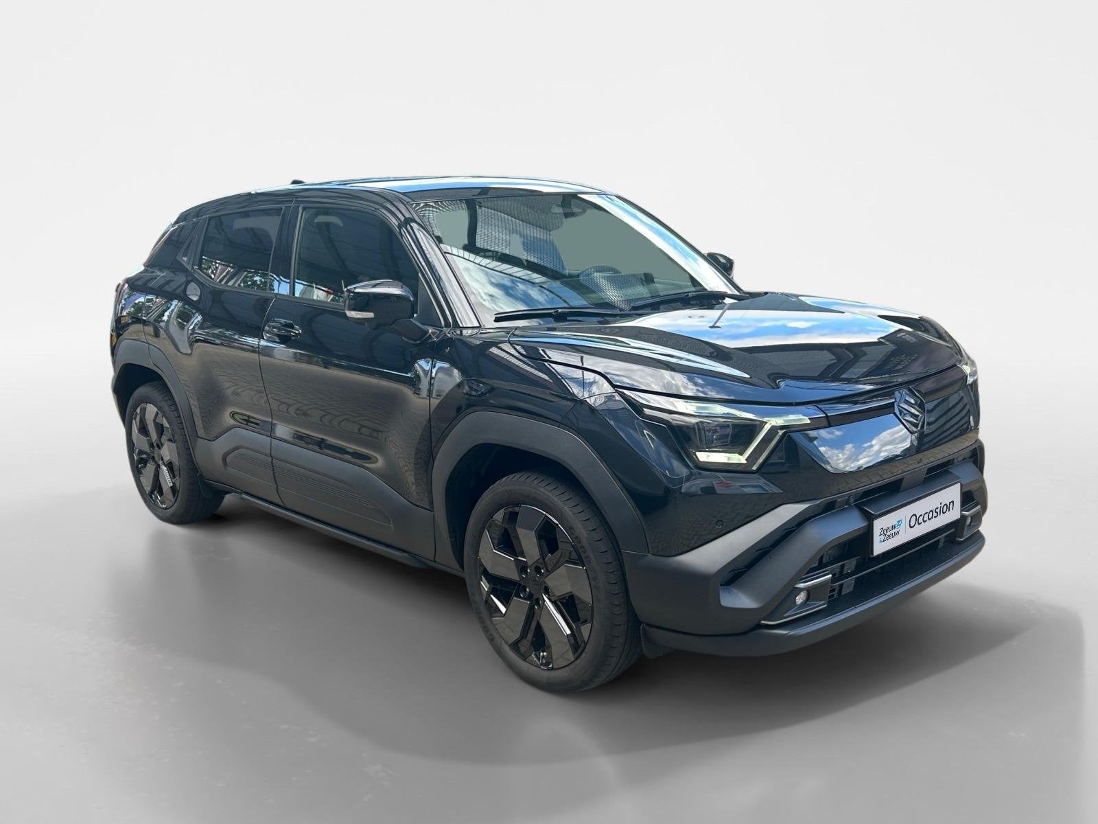 Suzuki e VITARA Style 61 kWh | Apple Carplay/Android Auto |, Auto's, 12 maanden, Verwarmde buitenspiegels, Leder en Stof, Zwart