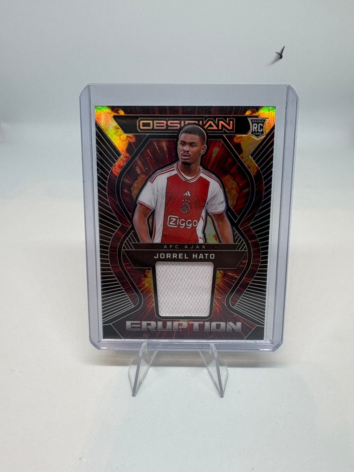 Panini Obsidian 2023-24 Jorrel Hato Ajax RC Patch /199, Hobby en Vrije tijd, Stickers en Plaatjes, Ophalen of Verzenden, Zo goed als nieuw
