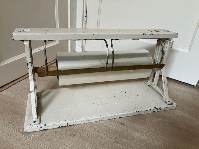 oude papierrolhouder, Ophalen