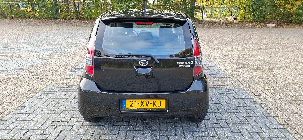 Daihatsu Sirion 1.0 51KW 2007 Zwart, Auto's, Voorwielaandrijving, Dealer onderhouden, Zwart, Handgeschakeld
