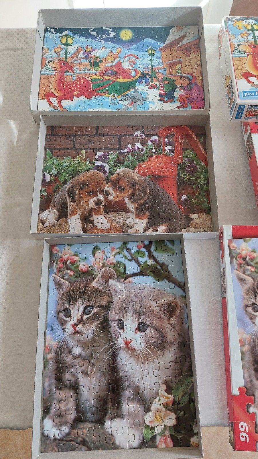 3 leuke kinderpuzzels: Kerst, puppy's en kittens, Ophalen of Verzenden, Meer dan 50 stukjes, Gebruikt, 4 tot 6 jaar