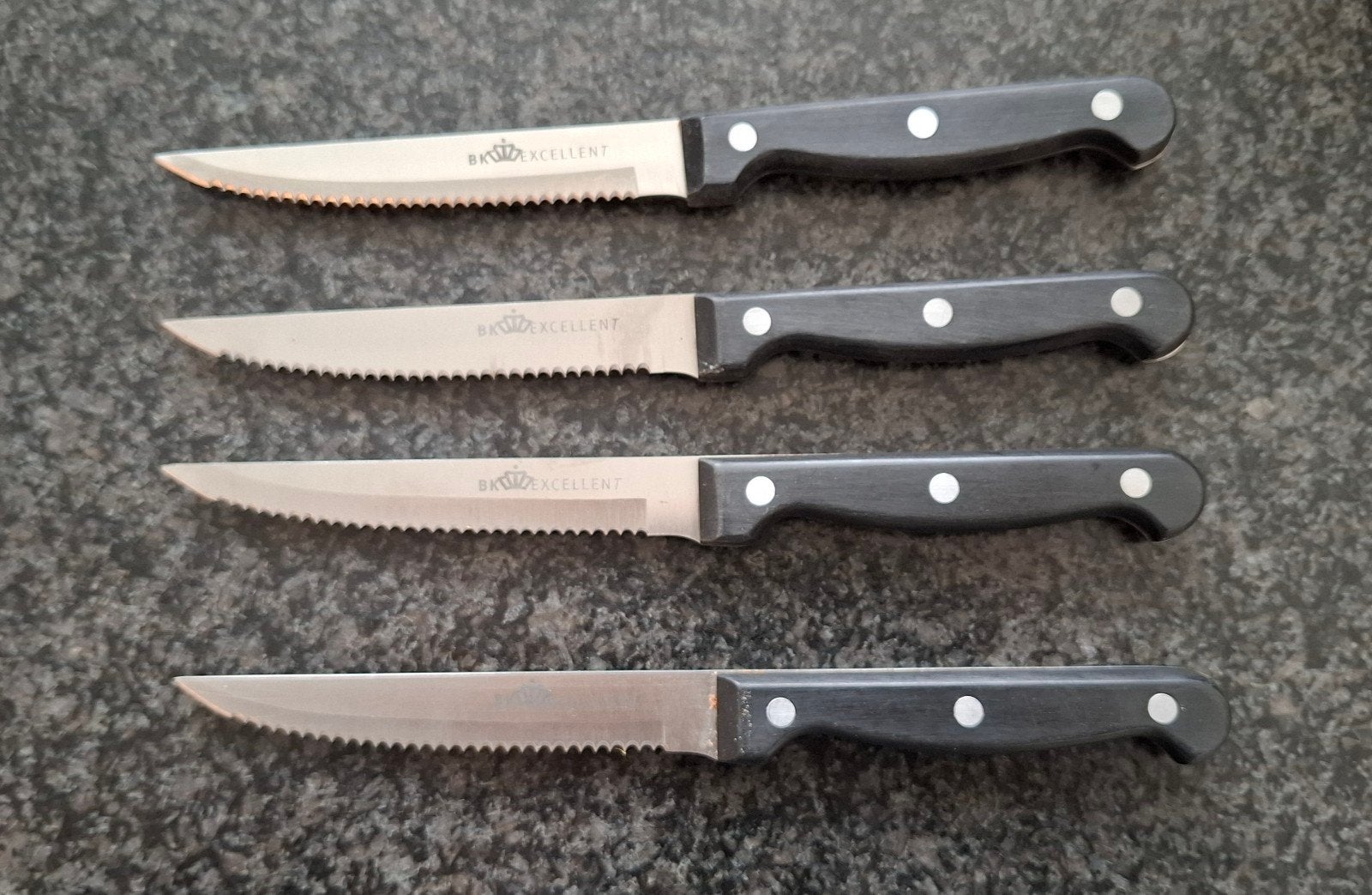 4 BK Excellent messen - Steakmessen met gekarteld lemmet, Bestekset, Ophalen of Verzenden, Zo goed als nieuw, Eetmes