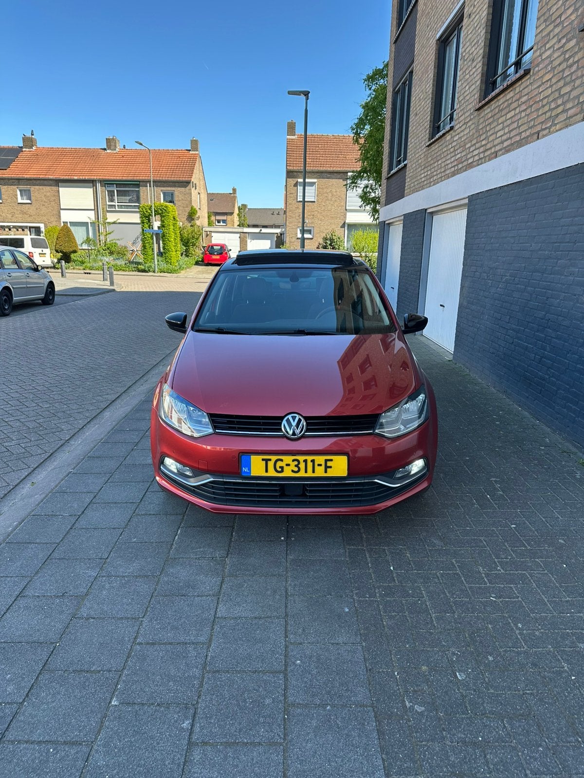 Volkswagen Polo 1.2 TSI 66KW DSG 2015 Rood, Auto's, Volkswagen, Stof, 40 €/maand, Zwart, 4 cilinders