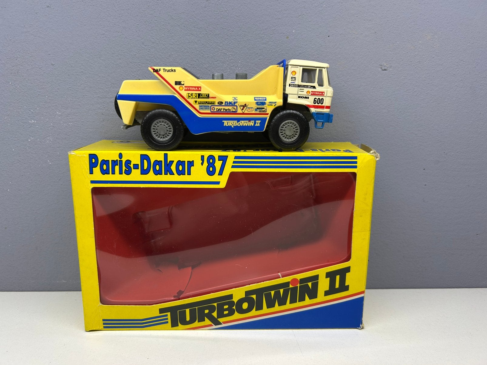 PORTEGIES DAF 3600 TURBO TWIN II Paris Dakar 87 #600 NMIB, Ophalen of Verzenden, Zo goed als nieuw, Bus of Vrachtwagen, Lion Toys