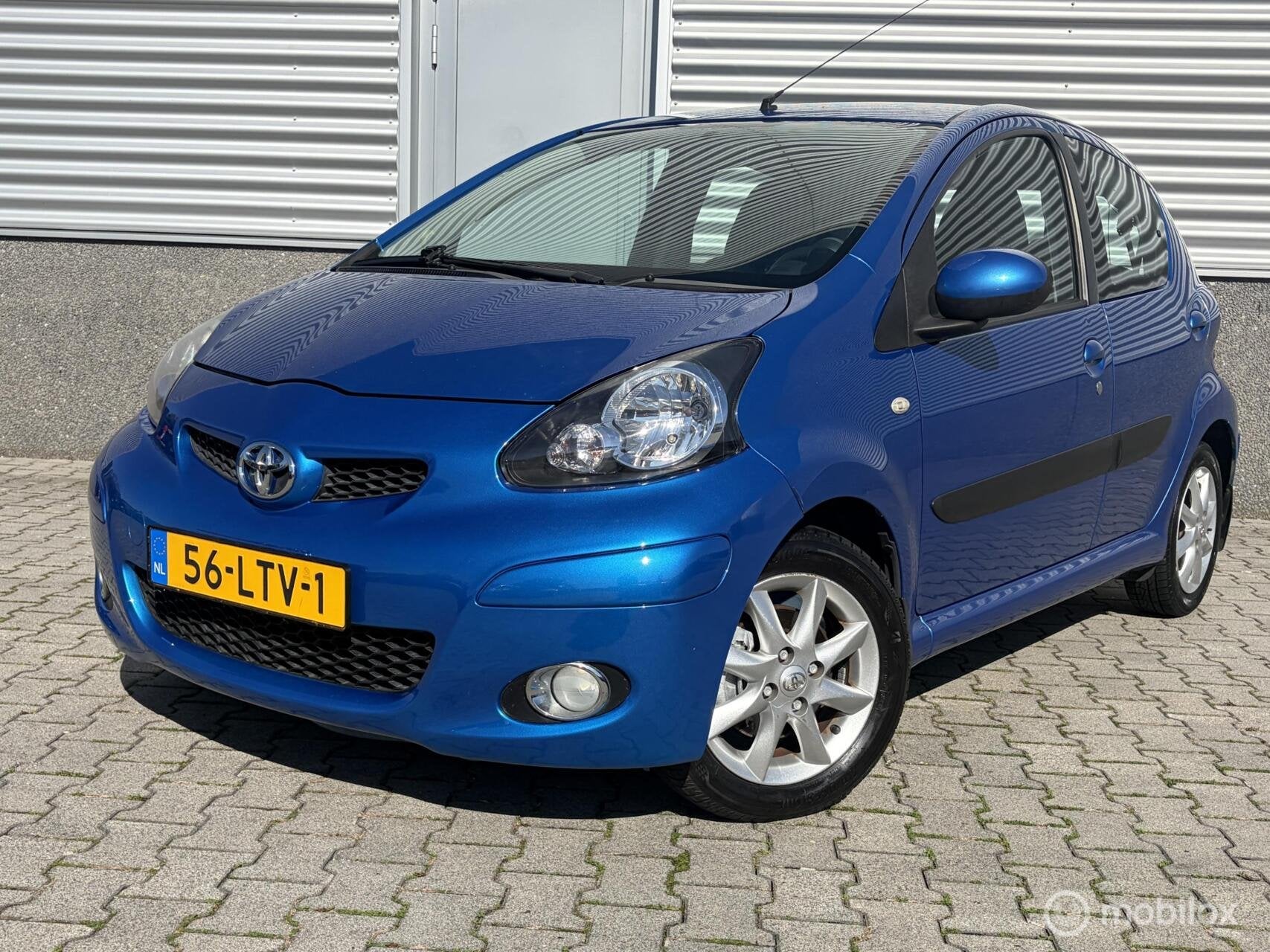 Toyota Aygo 1.0-12V Comfort Airco-Nieuwe apk, Auto's, Voorwielaandrijving, Stof, Gebruikt, Zwart