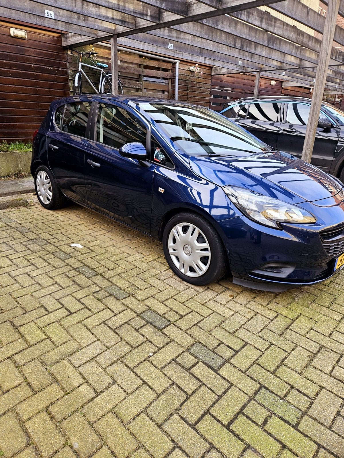 Opel Corsa 1.0T 66KW/90PK 5D 2016 Blauw, Auto's, Voorwielaandrijving, Blauw, Origineel Nederlands, 1200 kg