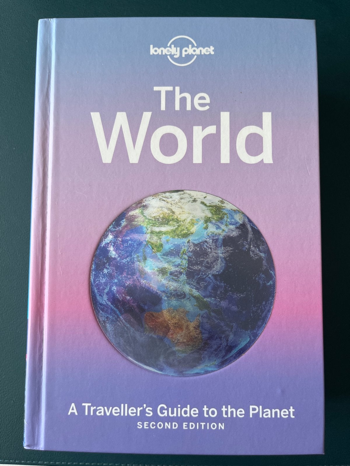 Lonely Planet The World: A Traveller's Guide to the Planet, Ophalen of Verzenden, Zo goed als nieuw, Reisgids of -boek, Lonely Planet